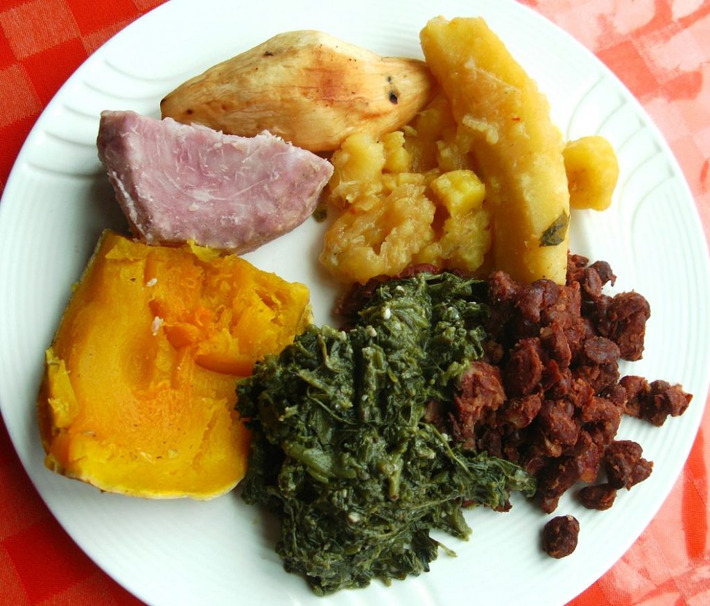 Traditional_ugandan_lunch_taro_sweet_potato__matoke_plantains_pumpkin_amaranth_and_beans